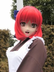 ���߂���